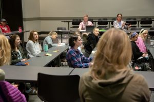students at the women in small business panel engage with the panel members