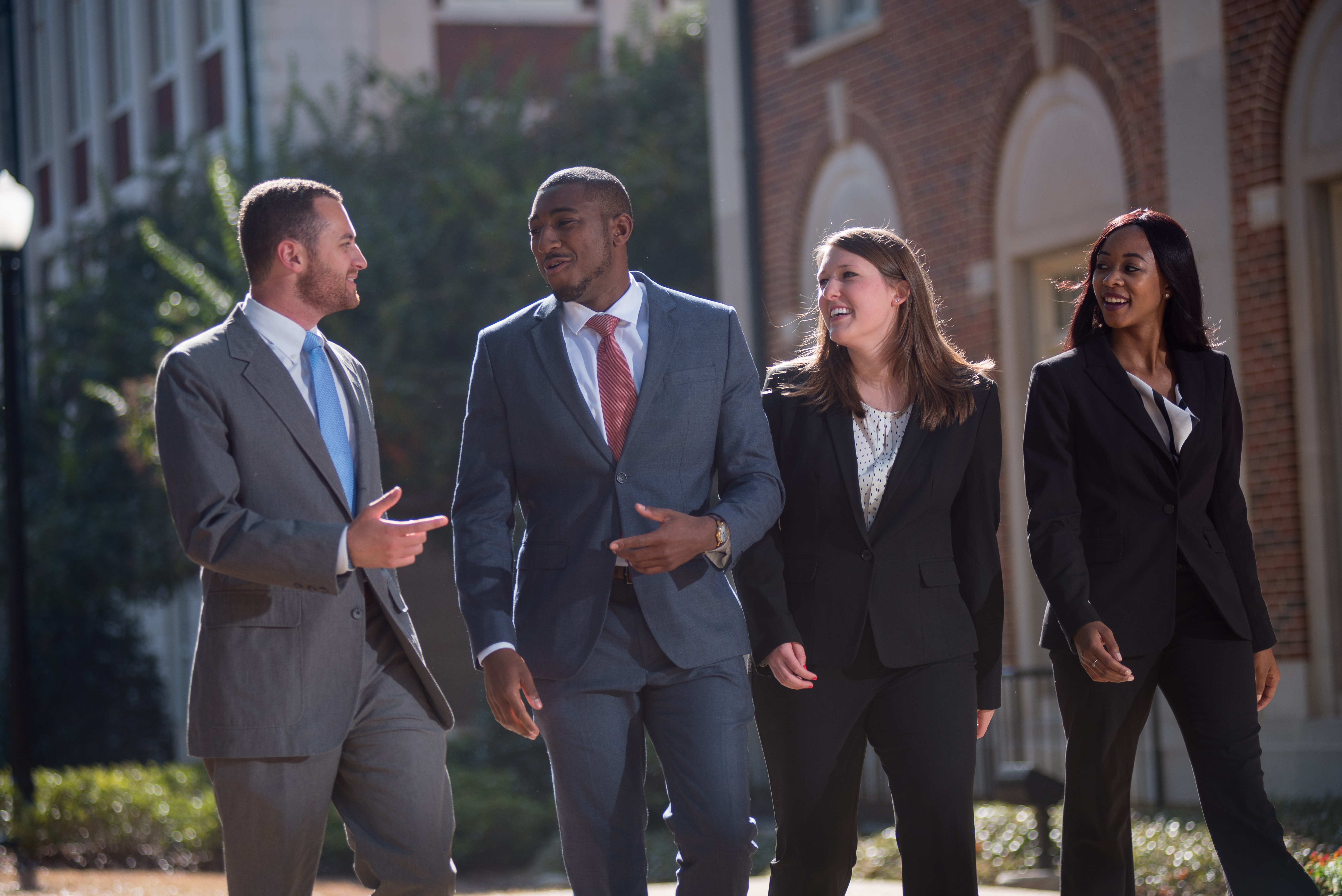students walking outside bidgood hall