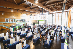 Room full of booths and students