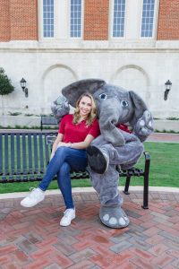 Besand with Big Al outside of Hewson Hall.