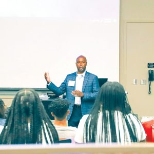 High school students learning about programs to get them ready for college.