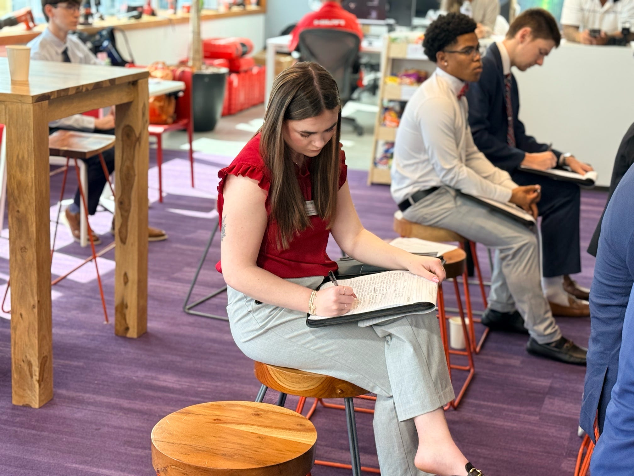 Hallie taking notes at Hilti