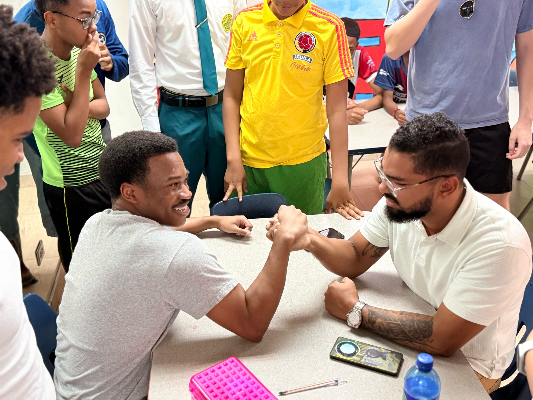 Service Learning, Arm Wrestling Aaron & Teacher