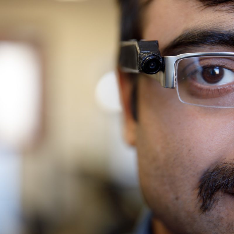 Tonmoy Ghosh, a UA doctoral student, models a prototype of a high-tech ingestion monitor inside a campus laboratory (The University of Alabama)