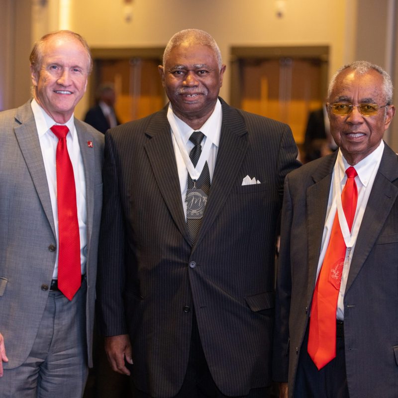(L-R): UA President Stuart Bell, Lifetime Achievement Award winner Terry R. Woods, Crimson Flame Award winner Dr. Arthur Dunning