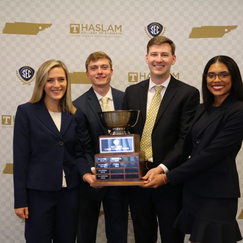 The Winning Manderson MBA Case team with their trophy.
