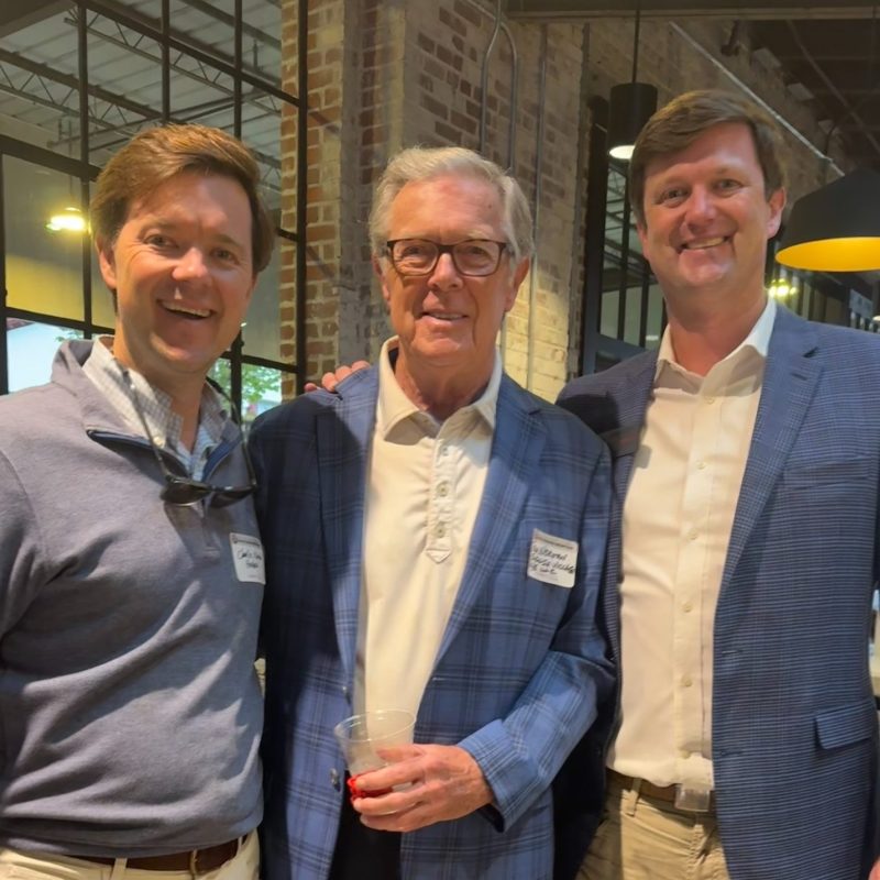 Stuart Norton (right) with his brother Charlie Norton (left) and father, Tom Norton (Center). Tom and Charlie both studied real estate at UA; Tom graduated in 1970 and Charlie in 2008.